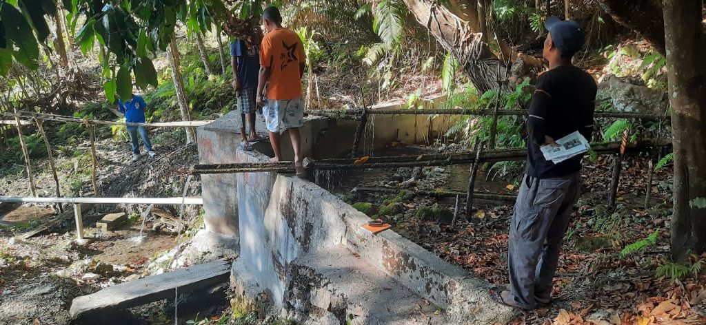 The dam at the spring which is the main water supply for Balibo